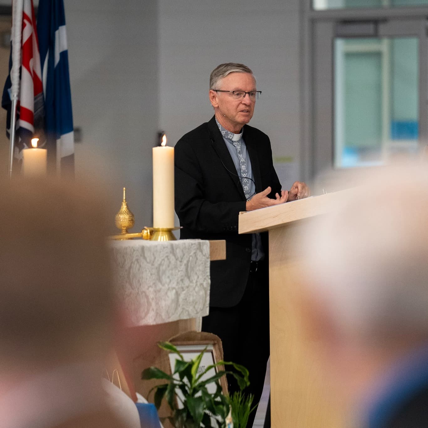 Bishop David Motiuk with members of the faithful during parish life.